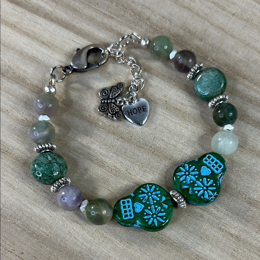 Silver and Green Skull Beaded Bracelet